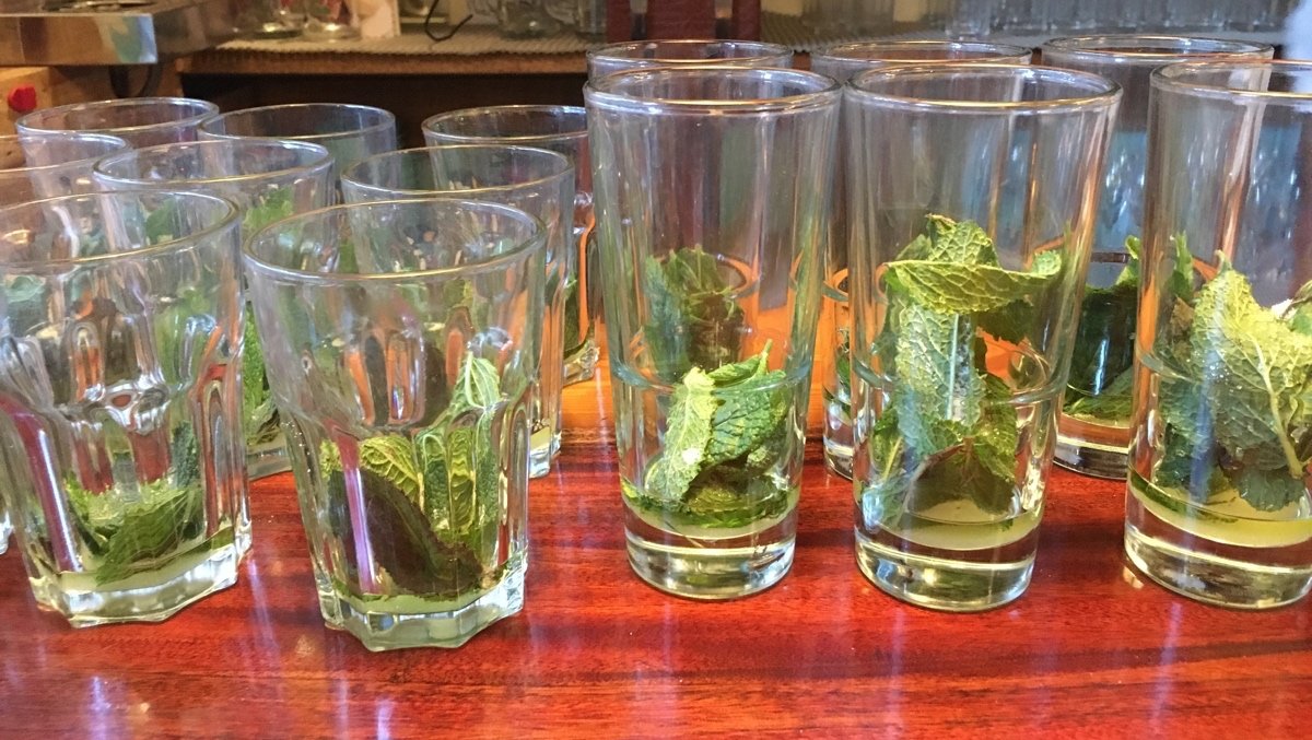 Cocktail glasses on a bar