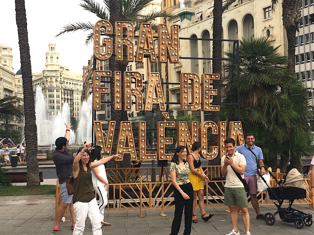 Event sign with people